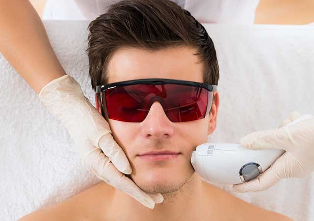 Man getting laser facial