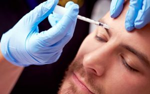Man receiving a Botox injection